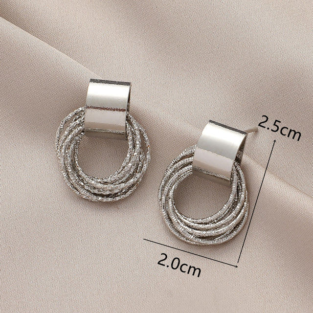 Women’s Stud Earrings with Circular Minimalist Design 1