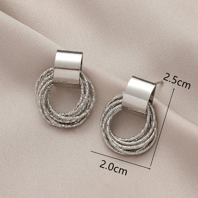 Women’s Stud Earrings with Circular Minimalist Design 1